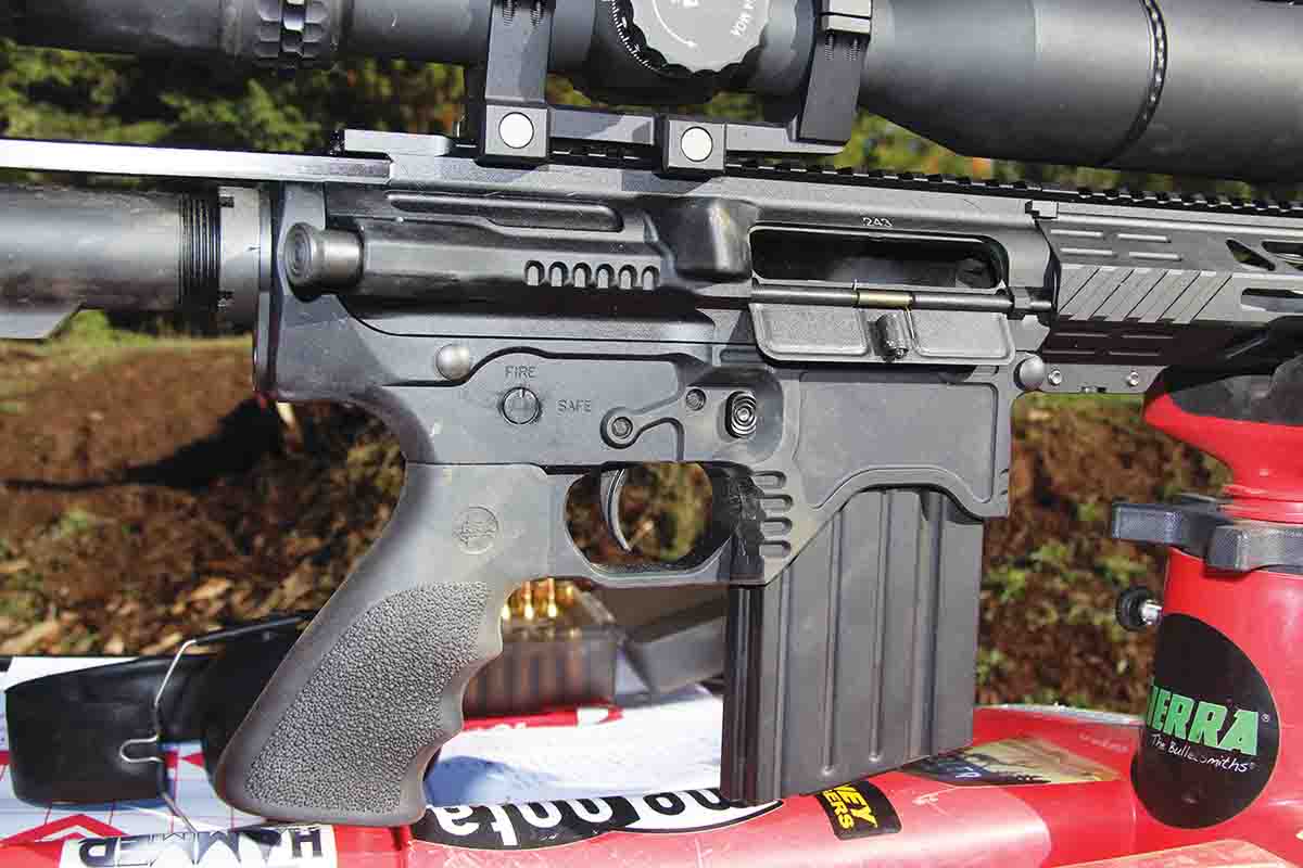The Predator HP LAR-8A included a LAR-8A lower holding a Hogue rubber pistol grip, spring-loaded dust cover and chamber-assist plunger. The rifle arrived with a steel, 20-round magazine.